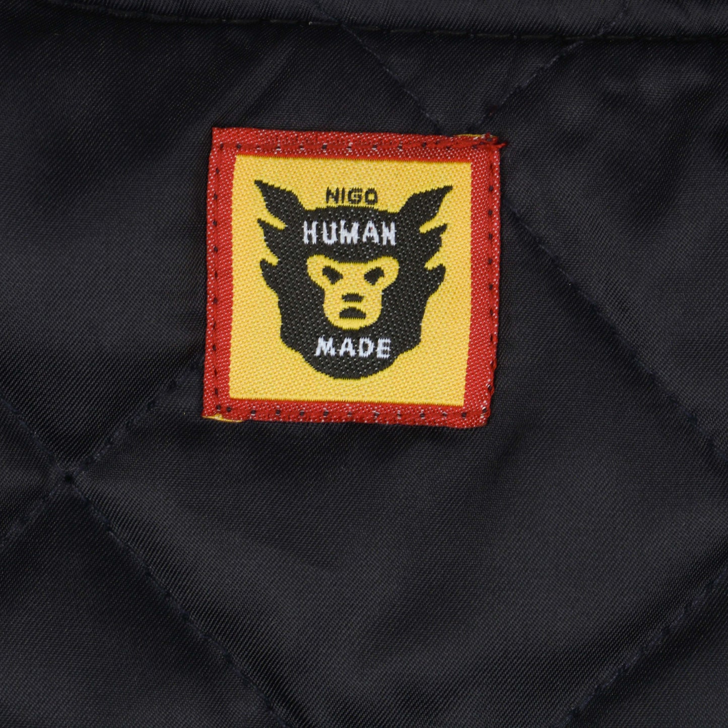 KAWS x Human Made Black Varsity Jacket
